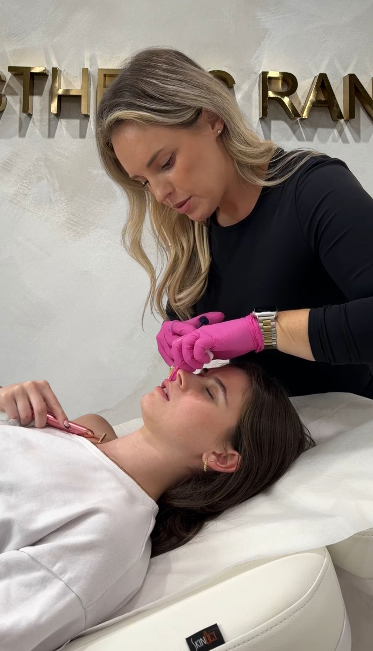 Natasha Wilkes, NP, performing a dermal filler injection on a patient at The Aesthetic Ranch in downtown Fort Lauderdale, Florida.