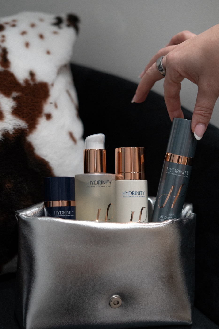 Hydrinity medical-grade skincare in a silver pouch at The Aesthetic Ranch in Fort Lauderdale, FL.